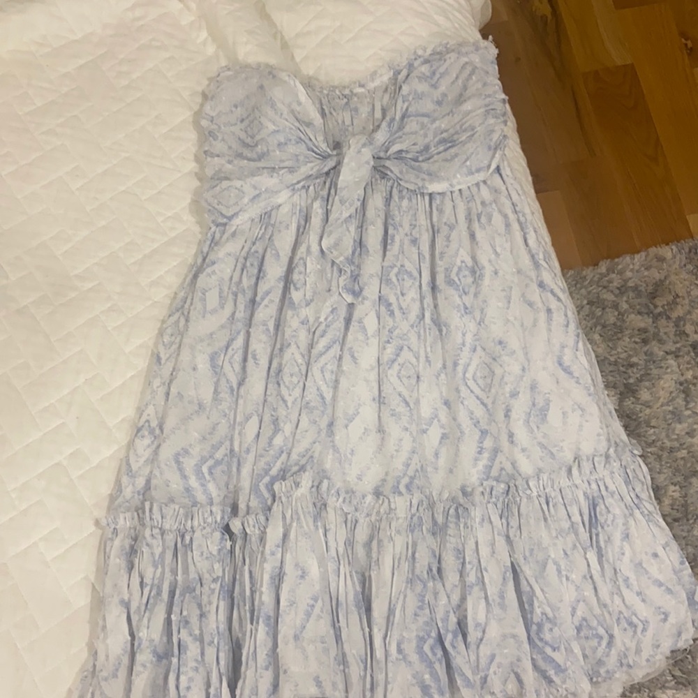 Strapless blue and white dress with frayed ends
